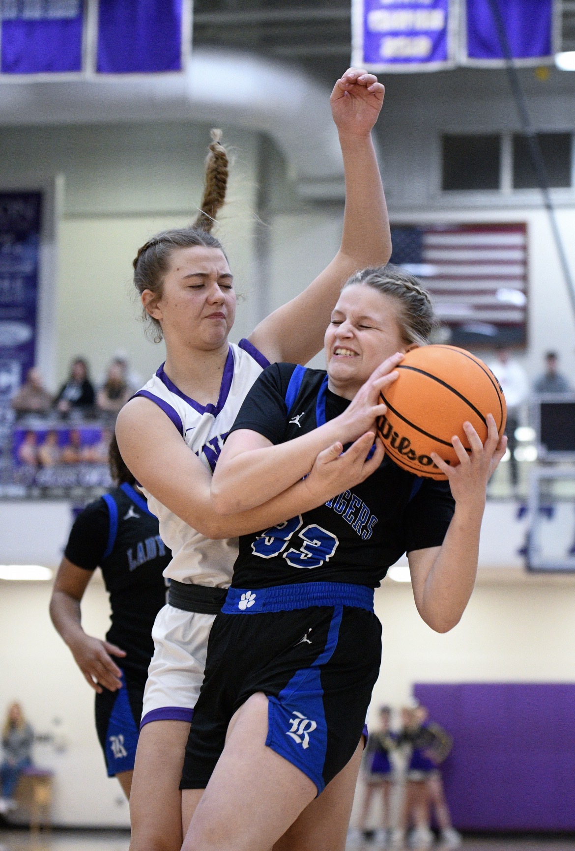 McKenna G Hood contesting a rebound and defending the block for Union County