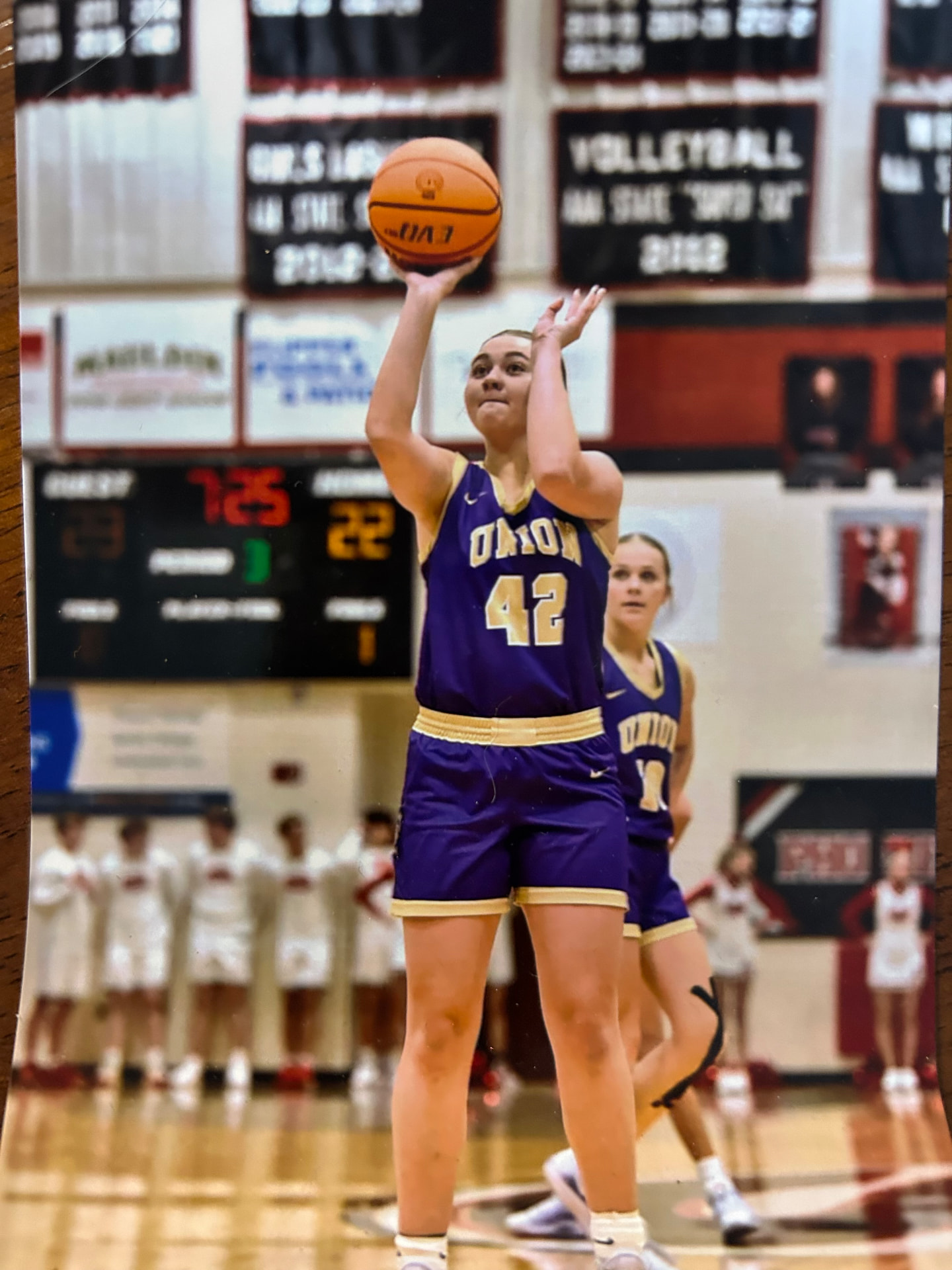 McKenna G Hood #42 shooting a free throw in the Union County purple road uniform